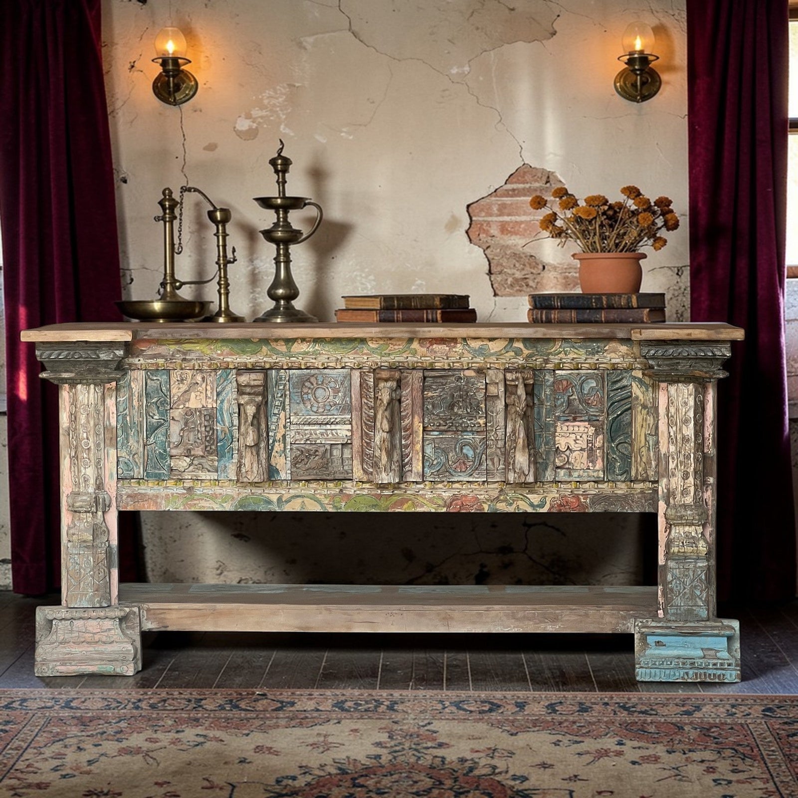Vintage furniture from Jodhpur — handcrafted carved polychrome console table with original teal paintwork, styled with antique brass decor
