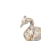 Decorative goose figure with a rustic finish on a white background