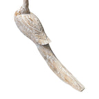 Decorative bird sculpture with detailed feathers on a white background