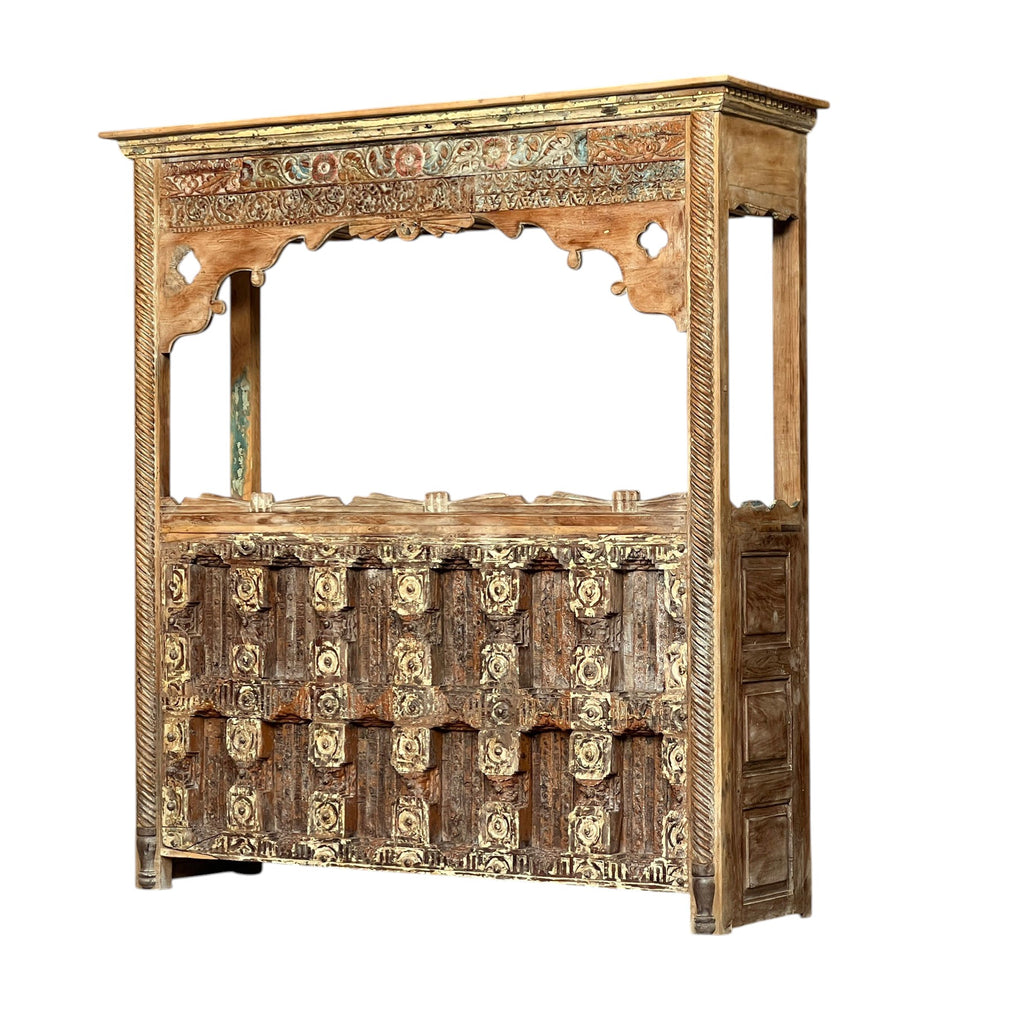 Carved Bar Counter — Stud Door & Floral Canopy