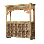 Carved Bar Counter — Stud Door & Floral Canopy