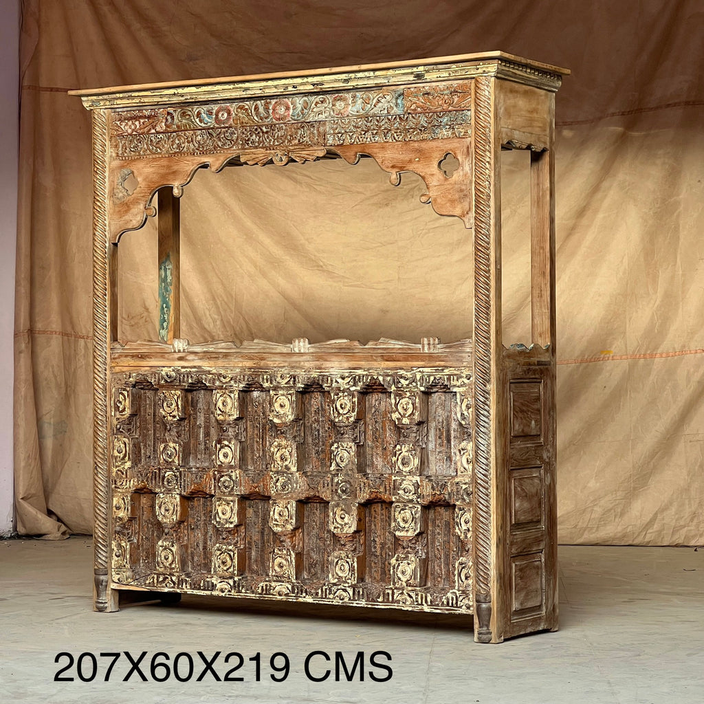 Carved Bar Counter — Stud Door & Floral Canopy