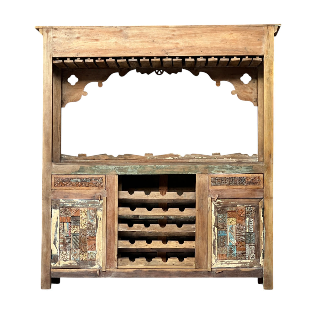 Carved Bar Counter — Stud Door & Floral Canopy