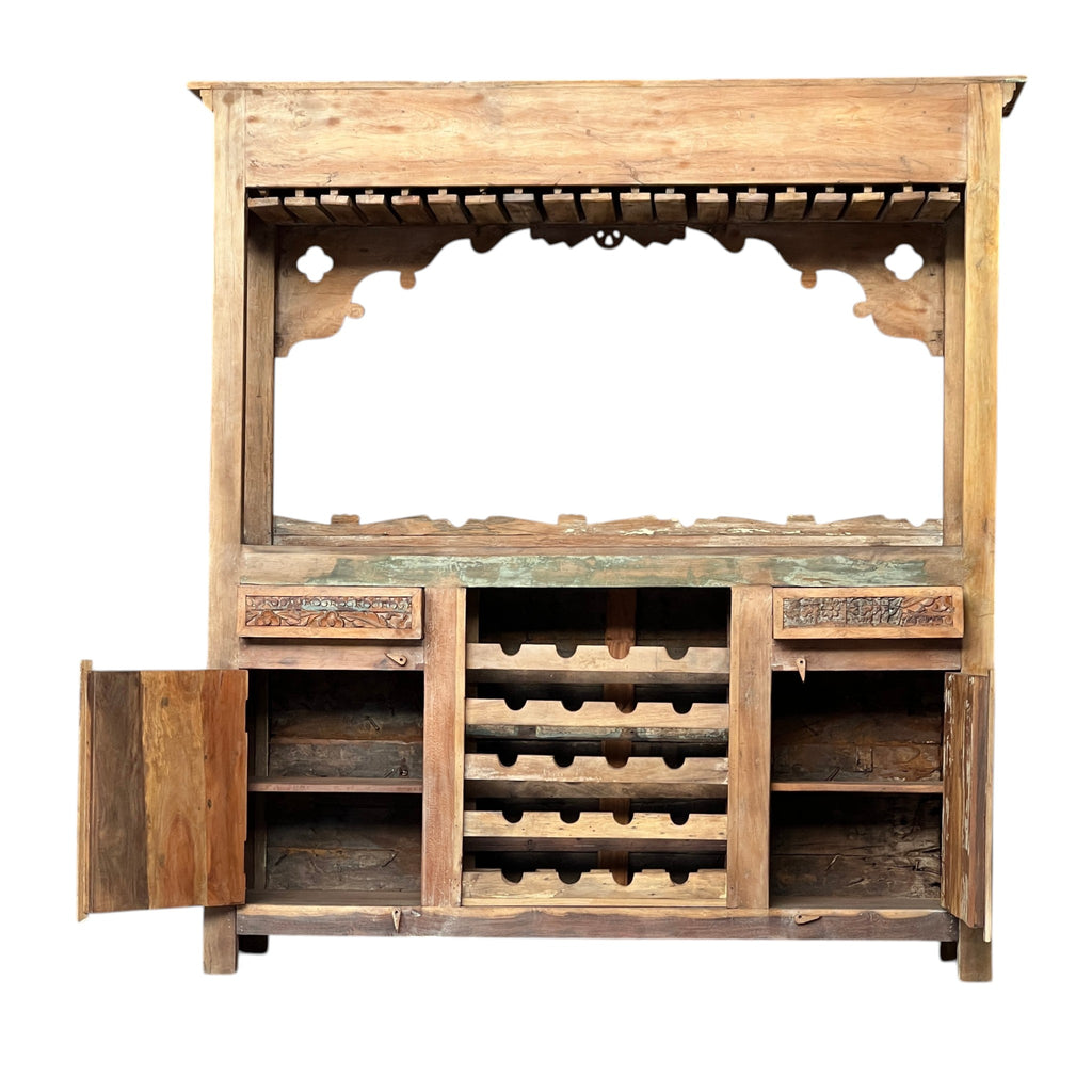 Carved Bar Counter — Stud Door & Floral Canopy