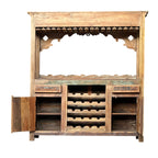 Carved Bar Counter — Stud Door & Floral Canopy
